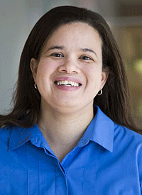 Mason assistant professor Shani Ross wears a blue shirt in her faculty profile