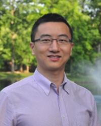 Mason associate professor Kai Zeng wears a light-colored shirt, glasses in his faculty profile