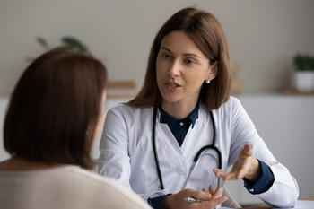 A doctor talks to a patient 