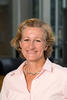 Mason professor Deborah Goodings wears a pink-collared shirt and has short dark, blonde hair in her faculty profile